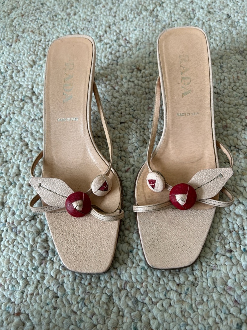 Prada Beige Leather Slide Mules with Red Button Detail